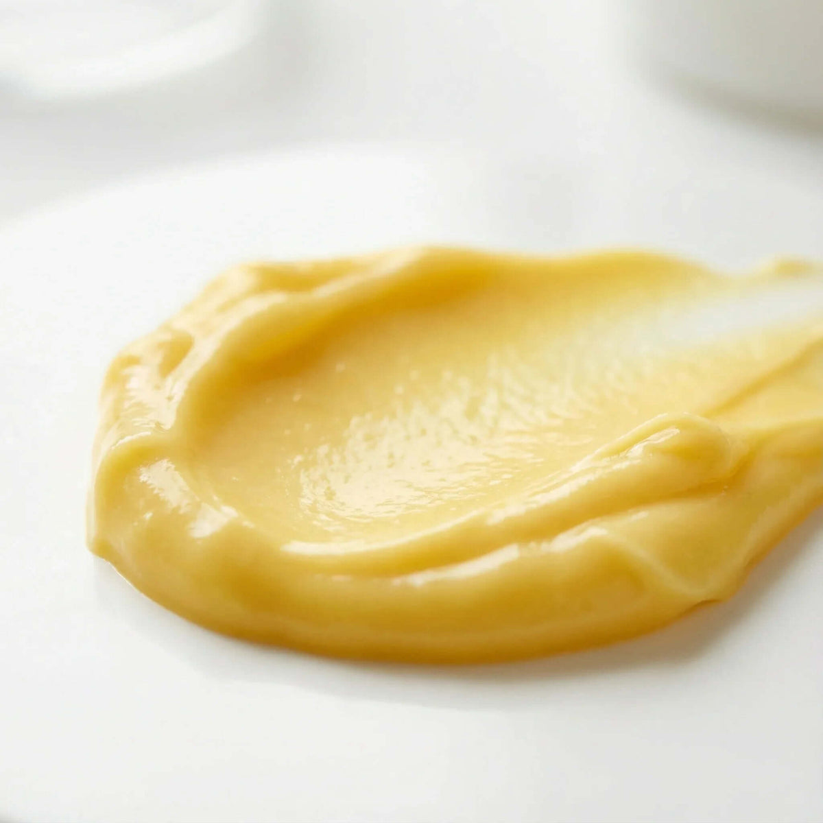 whitening night cream creamy texture showing its brightening and spot correction qualities DOS Cosmetics